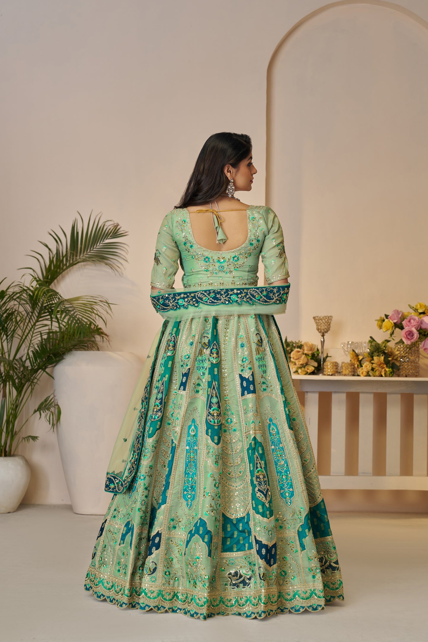 Rajsi Haathi Collection: Graceful Green Bridal Lehenga